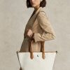 Bolsos tote medianos Bellport de lona reversible Ralph Lauren para mujer en color natural/azul marino Bolsos tote medianos Bellport de lona reversible Ralph Lauren para mujer en color natural/azul marino