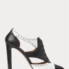 Botas Ralph Lauren Lindley de piel de becerro con bloques de color en blanco y negro para mujer Botas Ralph Lauren Lindley de piel de becerro con bloques de color en blanco y negro para mujer