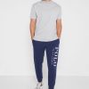 Pantalones deportivos con puños y logotipo de Ralph Lauren para hombre en azul marino