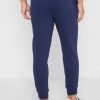Pantalones deportivos con puños y logotipo de Ralph Lauren para hombre en azul marino