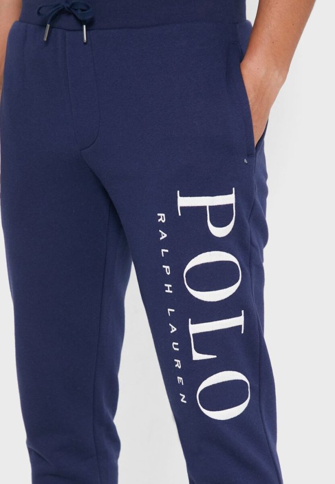 Pantalones deportivos con puños y logotipo de Ralph Lauren para hombre en azul marino