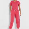 Pantalones deportivos de cintura alta hasta el tobillo de Ralph Lauren para mujer en color rosa