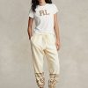 Pantalones deportivos de polar con motivo de copos de nieve de Ralph Lauren para mujer en color crema